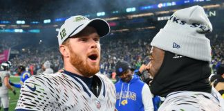 Darnold shows grit as Seahawks rally, clinch postseason berth