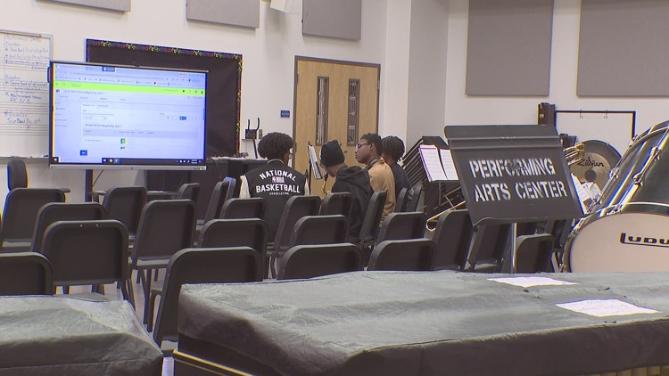 Hip hop producer gives back to school that helped foster passion for music