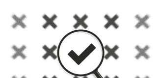An illustration of a magnifying glass magnifying a check mark in the midst of a field of blurred X marks.