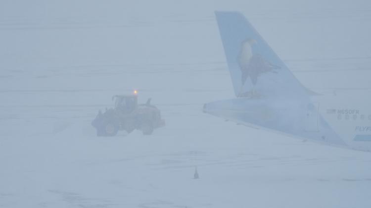 As flights slowly resume across US, expect delays and cancellations after winter storm
