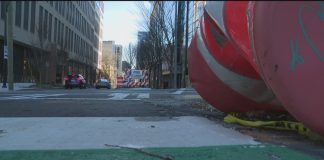 When will Juniper Street's new bike lane open in Midtown Atlanta?