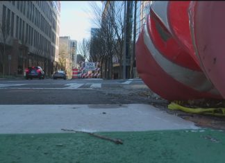 When will Juniper Street's new bike lane open in Midtown Atlanta?