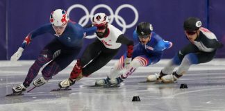 How did American short-track speedskater Clayton DeClemente do during his Olympic debut?