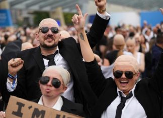 Pitbull aims for Guinness World Record for largest gathering of people wearing bald caps