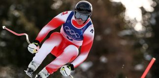 Switzerland wins first gold medal of Milan Cortina Games in men’s downhill