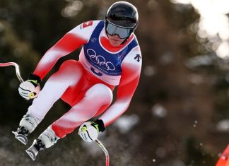Switzerland wins first gold medal of Milan Cortina Games in men’s downhill