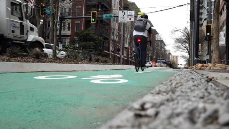 New bike lane officially opens along central Midtown artery New bike lane officially opens along central Midtown artery
