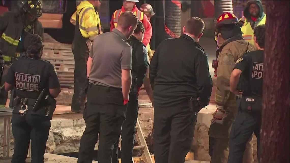 Worker rescued after falling into large hole in downtown Atlanta