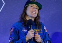 After historic moon mission, astronaut's homecoming gets tail-wagging welcome