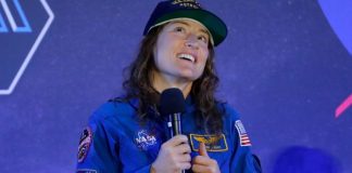 After historic moon mission, astronaut's homecoming gets tail-wagging welcome